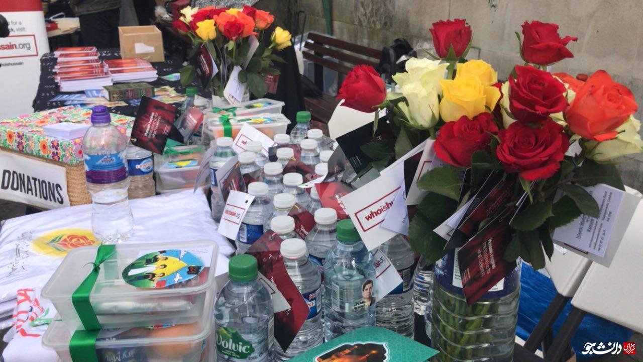 اهدای گل و توزیع جزوه اهداف قیام امام حسین در قلب لندن