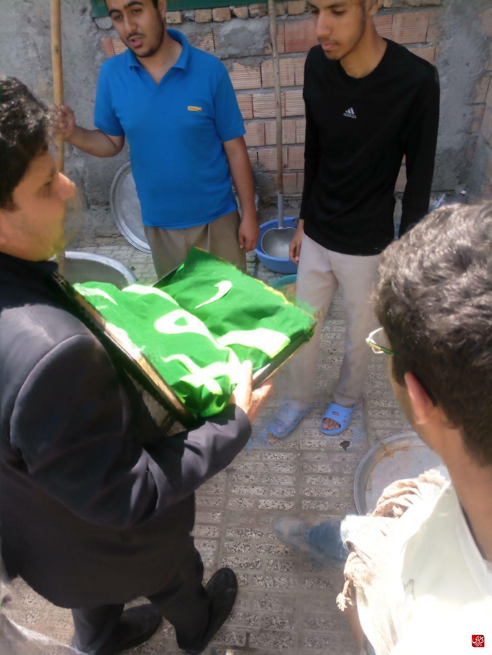 جهادگران دانشگاه فردوسی مشهد به پرچم حرم حضرت معصومه (س) متبرک شدند+تصاویر