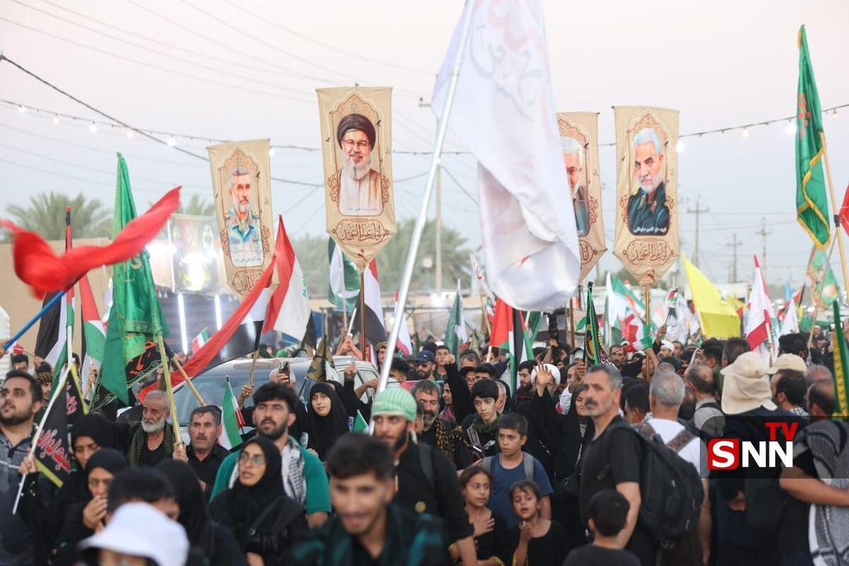 اهتزار پرچم کشور‌های حامی مقاومت در راهپیمایی عظیم اربعین؛ تجلی وحدت توسط دانشجویان و مردم
