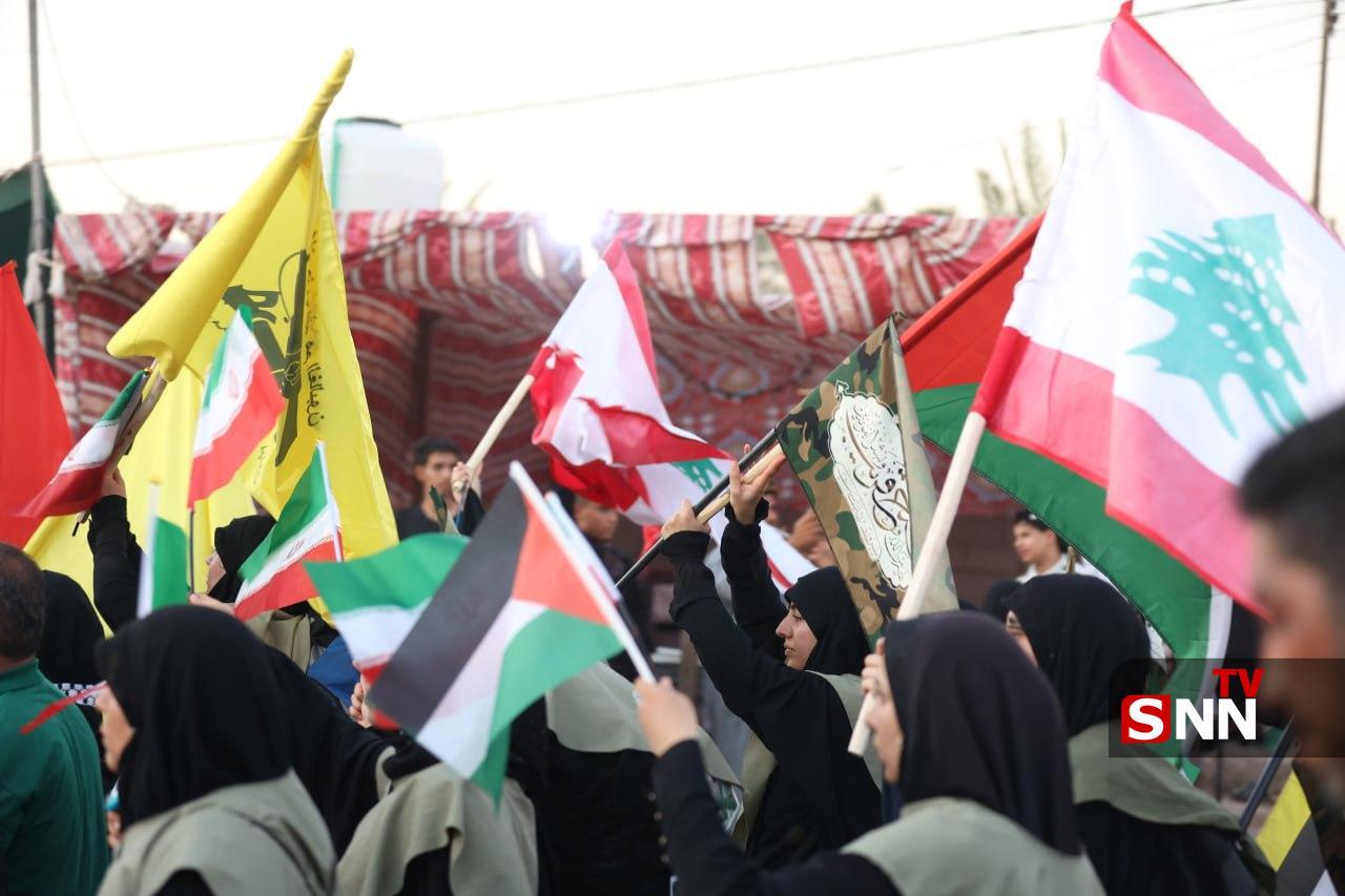 اهتزار پرچم کشور&zwnj;های حامی مقاومت در راهپیمایی عظیم اربعین؛ تجلی وحدت توسط دانشجویان و مردم