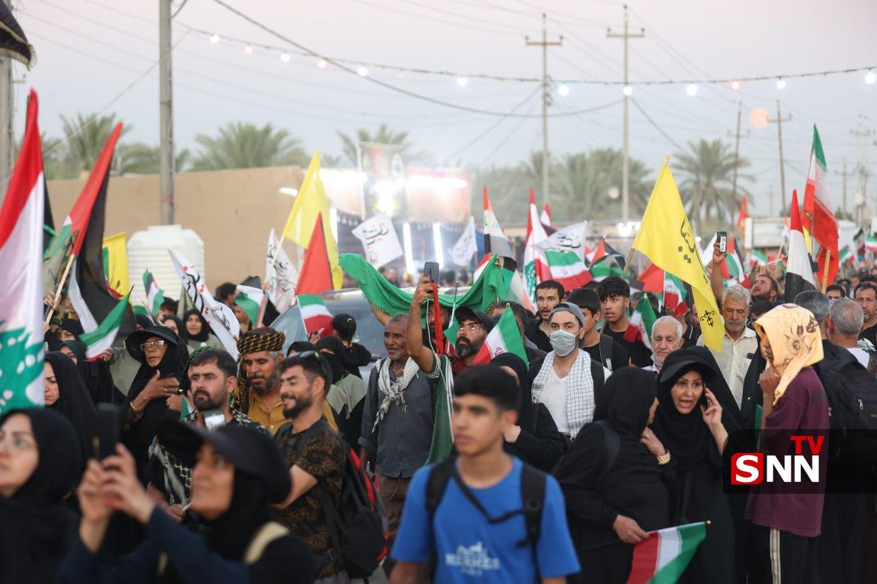 اهتزار پرچم کشور&zwnj;های حامی مقاومت در راهپیمایی عظیم اربعین؛ تجلی وحدت توسط دانشجویان و مردم