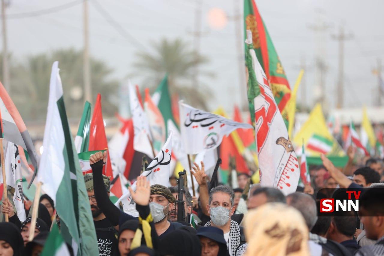 اهتزار پرچم کشور&zwnj;های حامی مقاومت در راهپیمایی عظیم اربعین؛ تجلی وحدت توسط دانشجویان و مردم