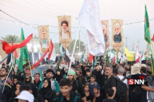 اهتزار پرچم کشور‌های حامی مقاومت در راهپیمایی عظیم اربعین؛ تجلی وحدت توسط دانشجویان و مردم