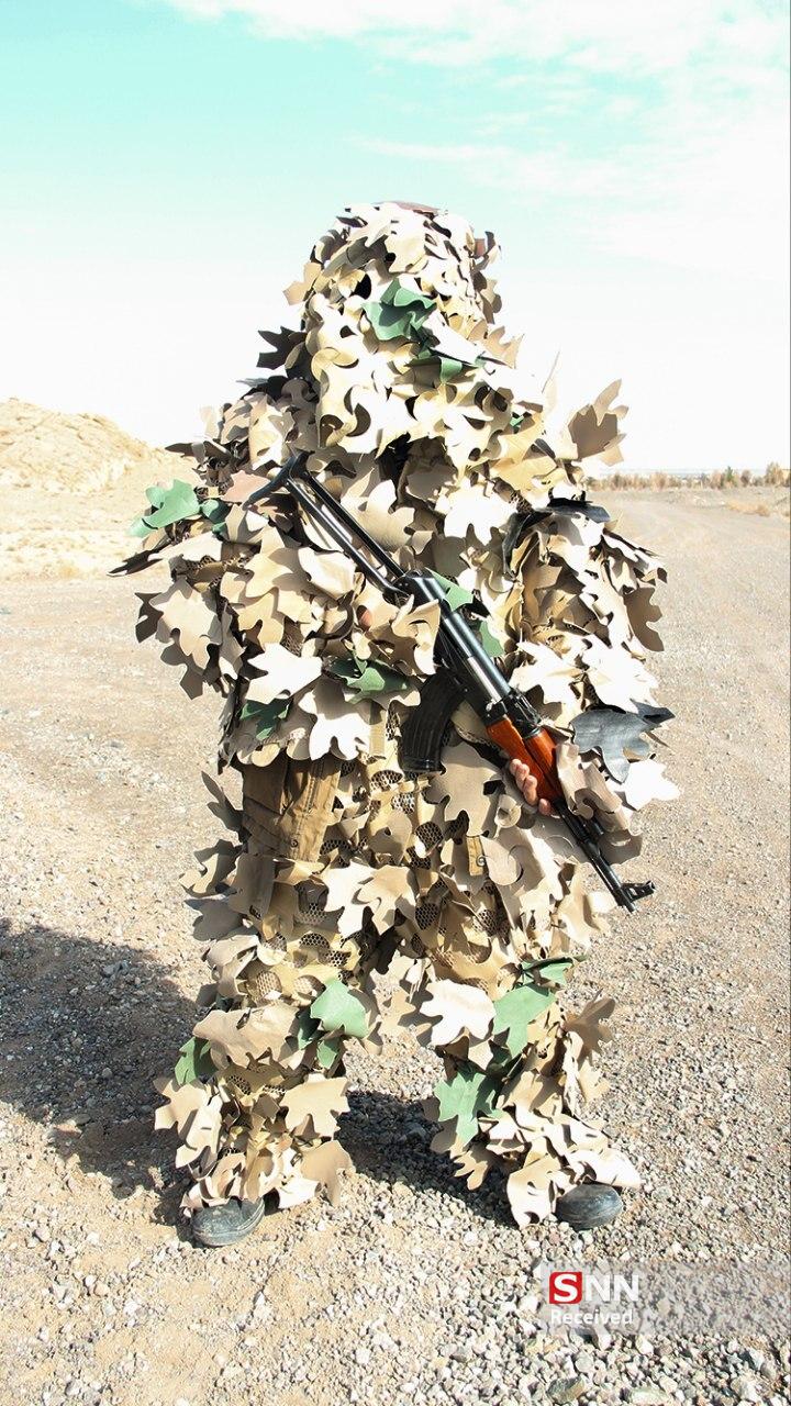 گزارش تصویری/ تک تیراندازان ارتش در حال پوشیدن البسه استتاری مخصوص