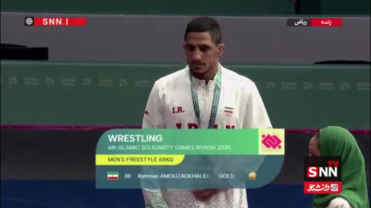 مدال طلا بر گردن رحمان عموزاد