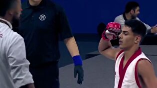 احترام نظامی امیرمحمد حاتمیان به پرچم ایران پس از کسب طلای MMA پسران