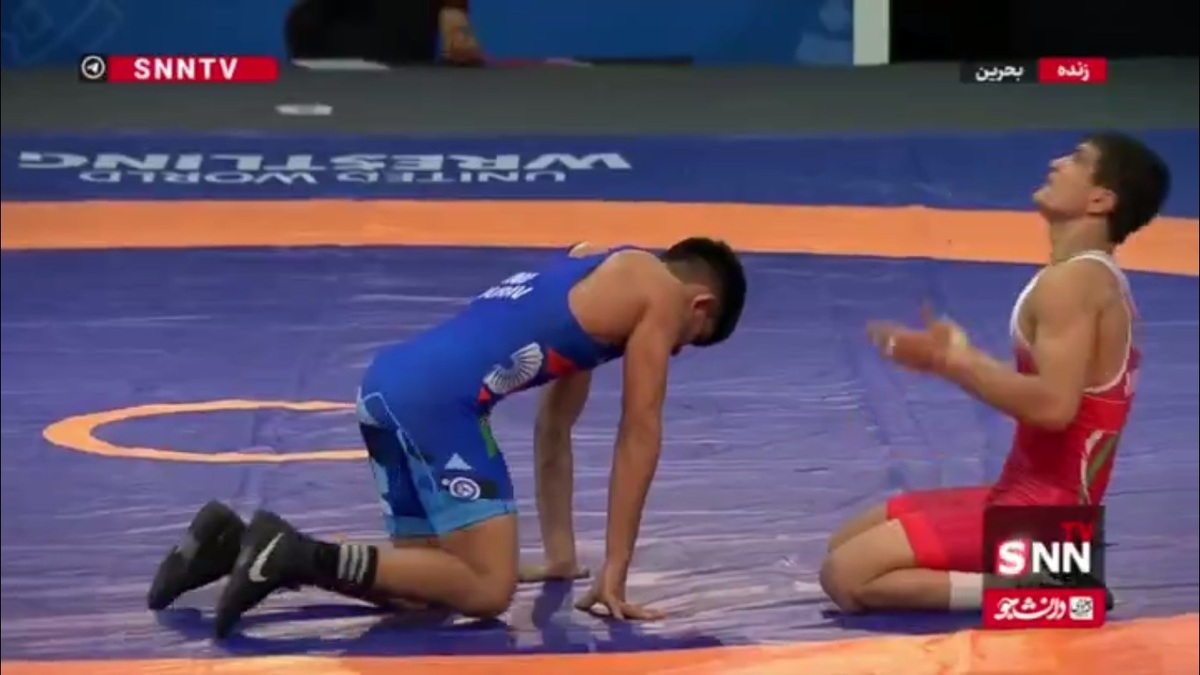 ابراز ارادت مرتضی حاج ملامحمدی آزادکار دهه هشتادی کشورمان به حضرت علی بن ابی طالب امیرالمومنین(ع) پس از کسب طلای بازی های آسیایی جوانان بحرین