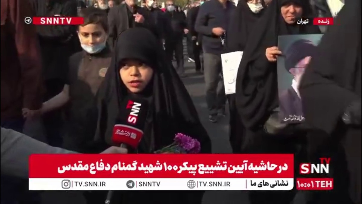 دختر دهه نودی حاضر در مراسم تشییع شهدای گمنام: اینجا هستم چون شهدا اینجا هستند