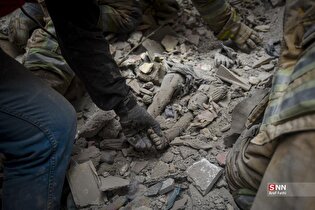 تلاش نیرو‌های امداد در جستجوی پیکر شهید ۷ ساله جنگ رمضان