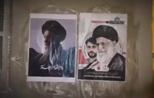 نصب تصاویر رهبر شهید انقلاب و شهید سید محمد موسوی در منطقه بنی‌جمره بحرین
