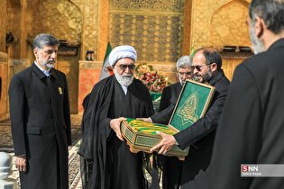 آیین تعویض پرچم و پوش ضریح مطهر رضوی