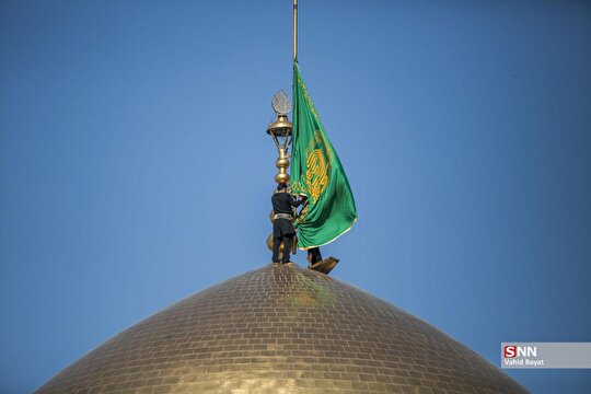 آیین تعویض پرچم و پوش ضریح مطهر رضوی