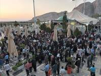 عطرافشانی گلزار شهدای بین المللی کرمان به روایت تصویر