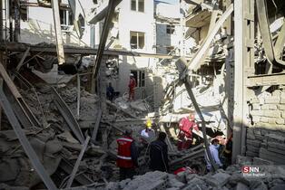 حمله آمریکایی - صهیونیستی به ساختمان مسکونی در خیابان مجاهدین اسلام