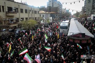 مراسم تشییع شهدای ناوگان دنا در میدان انقلاب تهران