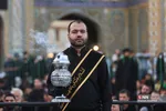 آیین تعویض پرچم حرم مطهر حضرت معصومه(س)