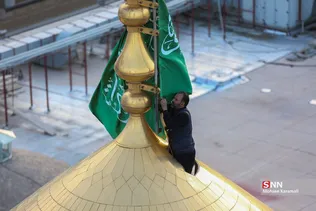 آیین تعویض پرچم حرم مطهر حضرت معصومه(س)