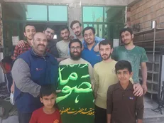 جهادگران دانشگاه فردوسی مشهد به پرچم حرم حضرت معصومه(س) متبرک شدند + تصاویر