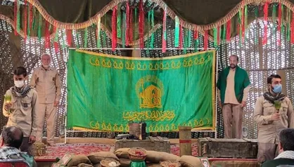 پرچم گنبد امام رضا (ع) در یادمان شلمچه به اهتزاز در می&zwnj;آید