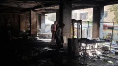 ساختمان درحال ساخت در خیابان سردار جنگل که صبح امروز دچار آتش‌سوزی شد