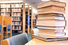 اهدای خانوادگی کتاب به کتابخانه سوخته