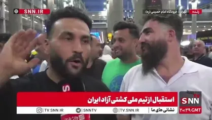 هوادار کشتی: قهرمانان کشتی تاج سر ما هستند/ تمام ۸۰ میلیون ایرانی باید سلام نظامی بدهند