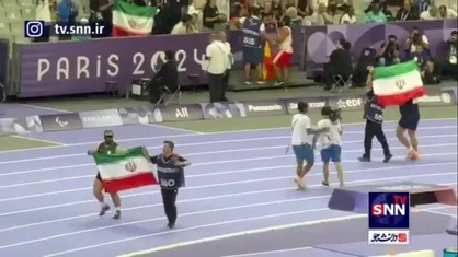 دور افتخار علیپور و اولاد با پرچم ایران در ورزشگاه پاریس