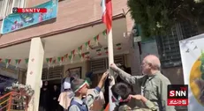 قالیباف همزمان با روز ملی پرچم، پرچم ایران را به اهتزاز درآورد + فیلم