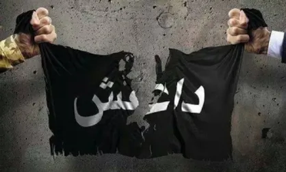 عکس/ پوشش زنانه و آرایش کردن مرد داعشی برای فرار