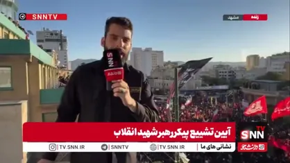 پیکر رهبر شهید در حال رسیدن به آغوش یار
