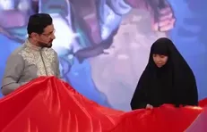 اهدای پرچم گنبد حضرت سیدالشهدا (ع) به سیده زینب نصرالله
