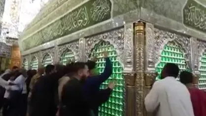 گل&zwnj;آرایی ضریح امیرالمومنین (ع) به&zwnj;مناسبت ولادت حضرت زینب (س)