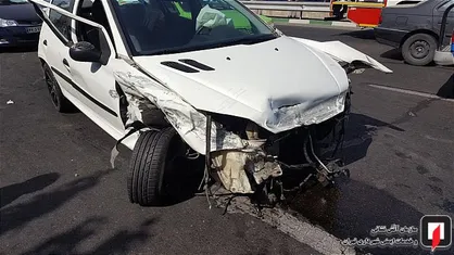 نجات راننده جوان از کانال آب +عکس