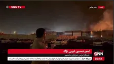 ببینید| جابجایی کانتینرها؛ شگرد آتش نشان‌ها برای جلوگیری از سرایت حریق + فیلم
