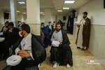 
ملبس شدن جمعی از طلاب به دست آیت الله نوری همدانی
