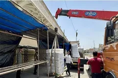 برپایی موکب اصناف شیراز در مسیر قم - تهران برای خدمت به زائران امام شهید