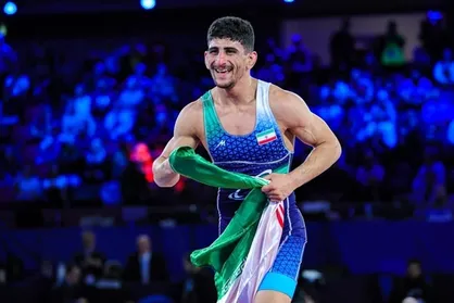 خدا رو شکر گرایی قهرمان شد تا نذرش ادا شود/ شهید گمنام خانه کشتی خیلی برایمان پر خیر و برکت بوده است