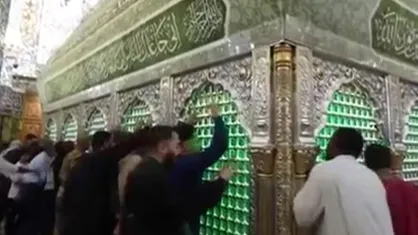 گل&zwnj;آرایی ضریح امیرالمومنین (ع) به&zwnj;مناسبت ولادت حضرت زینب (س)
