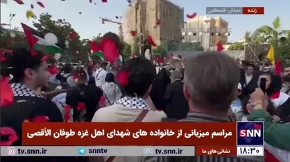 گلباران خانواده&zwnj;های شهدای فلسطینی در بدو ورود به میدان فلسطین توسط خانواده&zwnj;های تهرانی