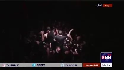 هروله ظهر عاشورایی عزادارن حسینی در هیئت ثارالله زنجان با مداحی مهدی رسولی