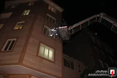 نجات ۱۳ مرد و زن از آتش سوزی ساختمان ۵ طبقه +عکس