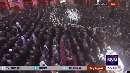 اقامه نماز ظهر عاشورا توسط عزاداران حسینی در حرم امام حسین(ع)