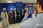 
ملبس شدن جمعی از طلاب به دست آیت الله نوری همدانی
