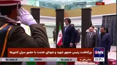 ادای احترام نخست وزیر گرجستان و هیات همراه به پیکر رئیس‌جمهور شهید و دیگر شهدای خدمت
