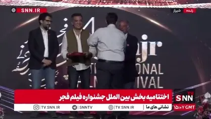 دیپلم افتخار برترین فیلم 60 ثانیه ای جشنواره جهانی فیلم فجر به علی توسلی خبرنگار مقاومت خبرگزاری دانشجو تعلق گرفت