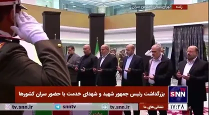 هیات بلندپایه مقاومت حماس و هیات همراه به پیکر رئیس&zwnj;جمهور شهید و دیگر شهدای خدمت ادای احترام کردند