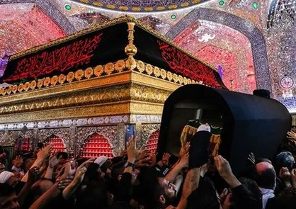 تشییع پیکر آیت الله حکیم در حرم مولا علی(علیه السلام) +عکس و فیلم