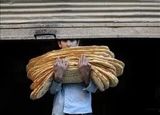 سفره افطاری خیابانی برای مناطق حاشیه نشین تهران پهن می‌شود / توزیع نان رایگان در مناطق محروم