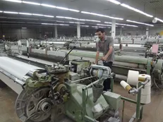 بررسی مشکلات ایران پوپلین در سفر رئیس جمهور به گیلان / حال ناخوش کارخانه‌های صنعتی در استان