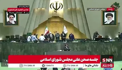 تقدیم پیراهن تیم ملی به قالیباف / تقدیر از کشتی گیران مدال آور جهانی در صحن علنی توسط رئیس مجلس و وزیر وزرش و جمعی از نمایندگان
